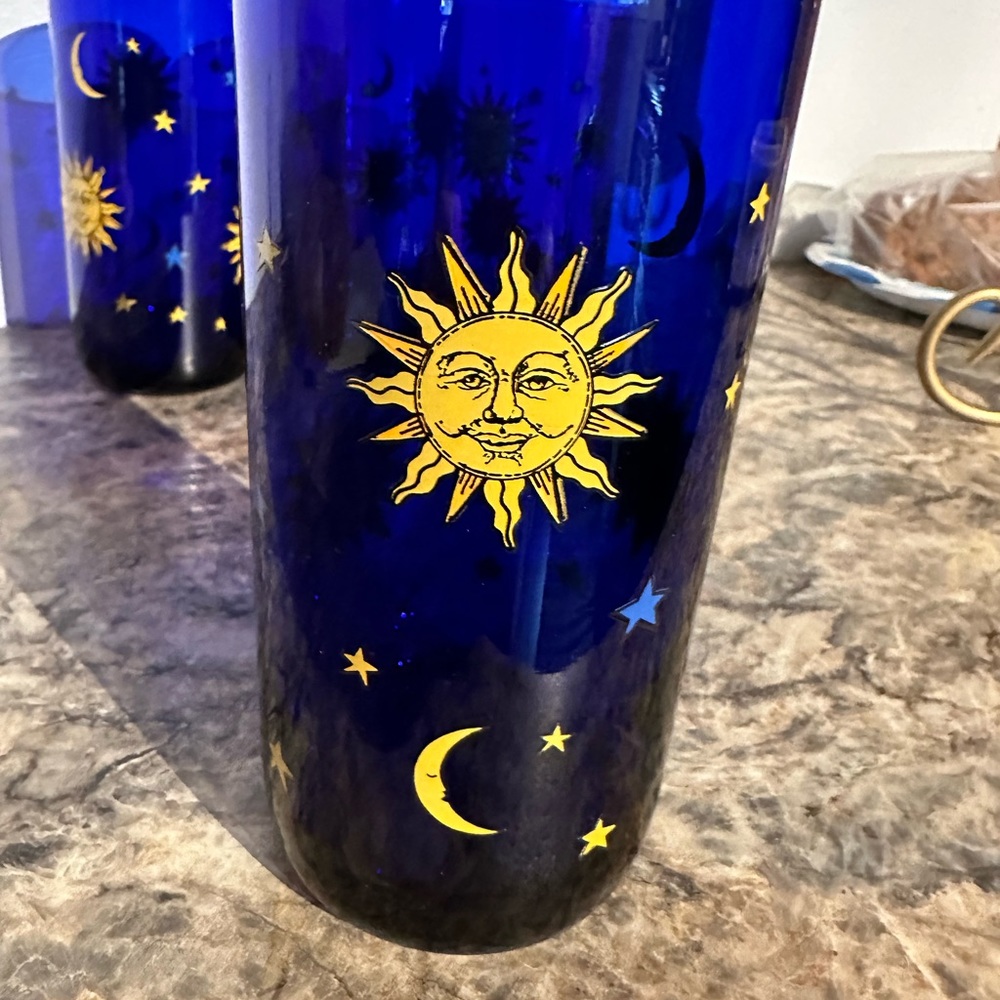4pack Sun and Moon blue designer kitchen glasses.  Had for awhile never used.
